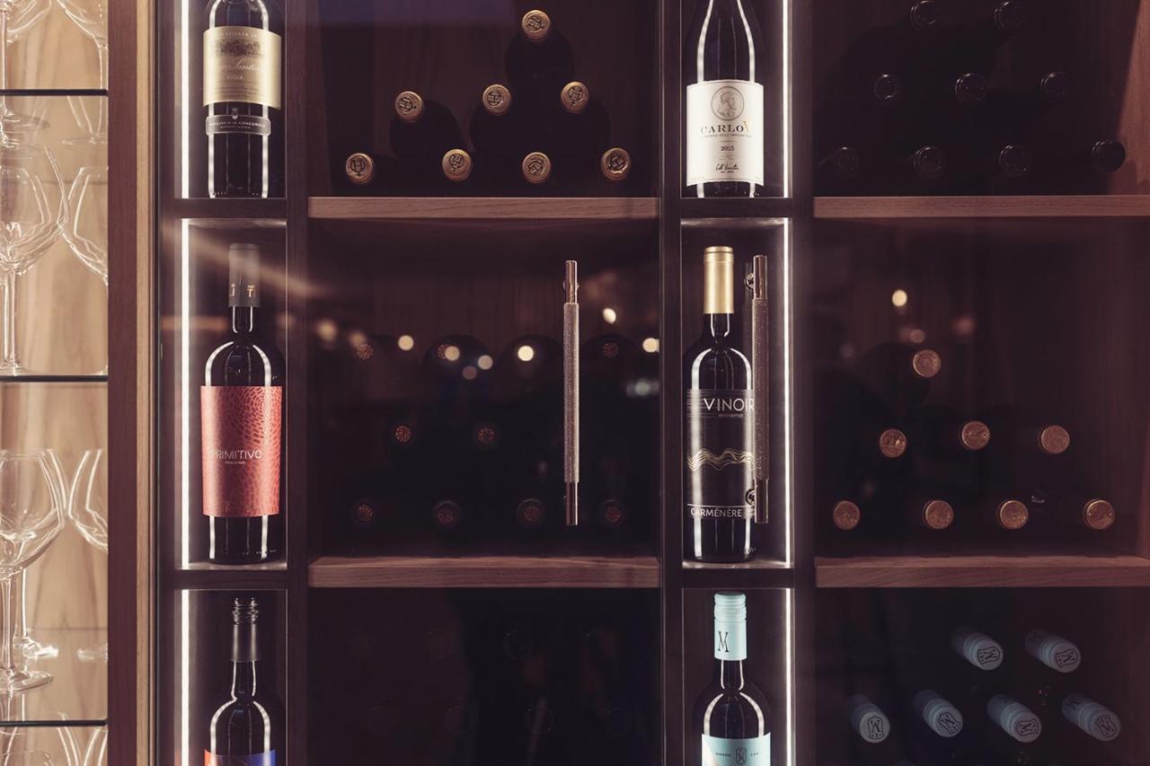 Longlands Inn & Cottages Carnforth Εξωτερικό φωτογραφία Wine bottles in a wine rack