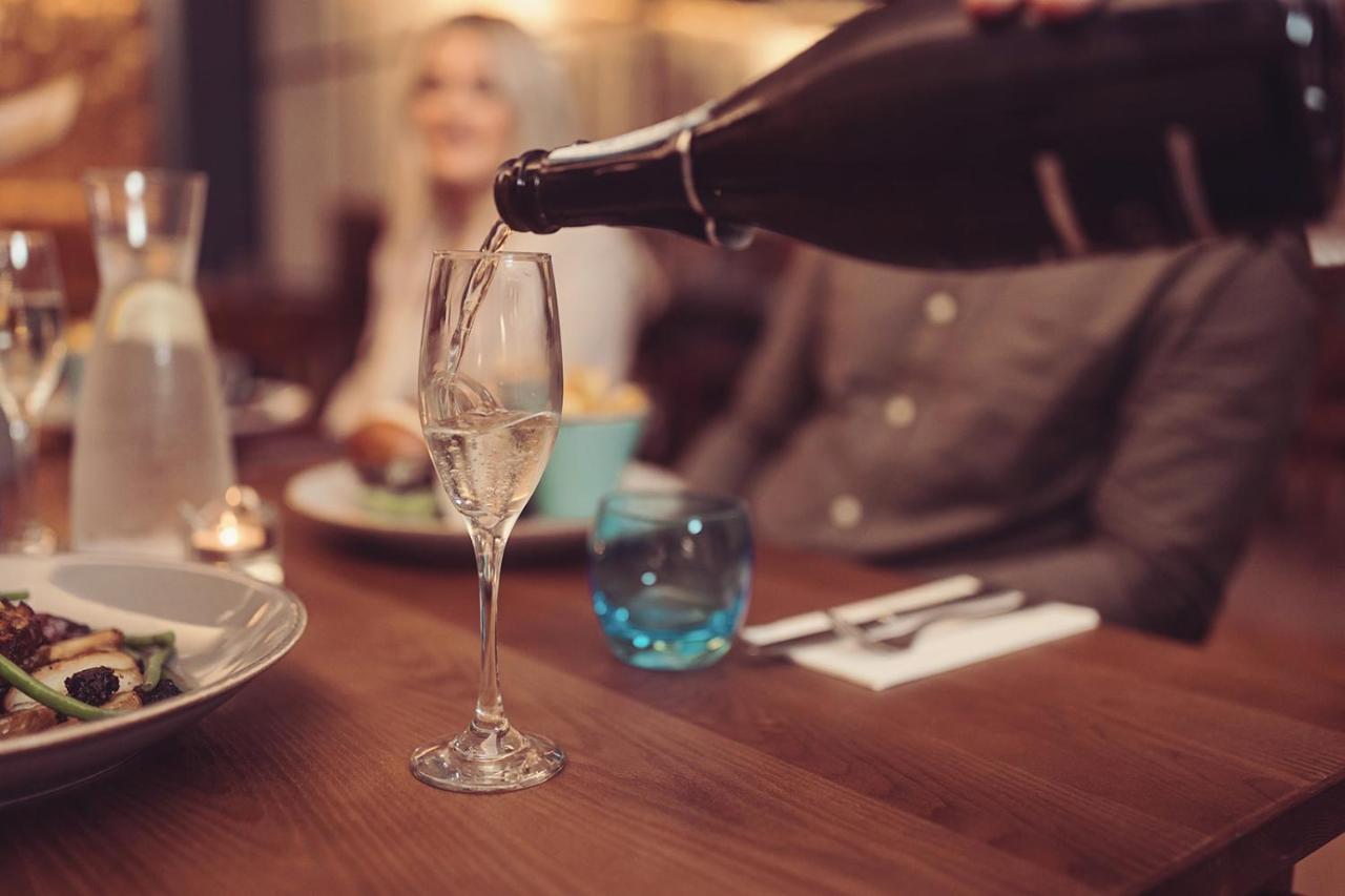 Longlands Inn & Cottages Carnforth Εξωτερικό φωτογραφία Champagne being poured